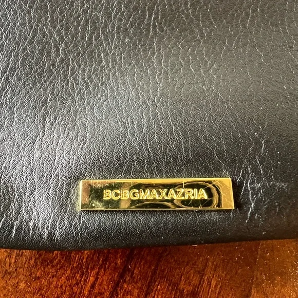 BCBGMaxAzria Black Fold-Over Clutch with Gold Accent - Picture 2 of 9